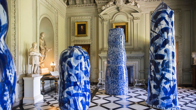 Four large blue and white Expressions exhibition porcelain sculptures on show in the Marble Hall, Petworth House